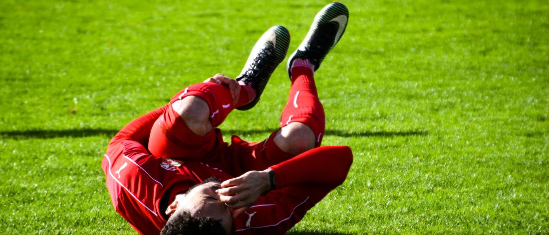 Soccer player with a knee injury