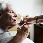 Elderly man taking Rember