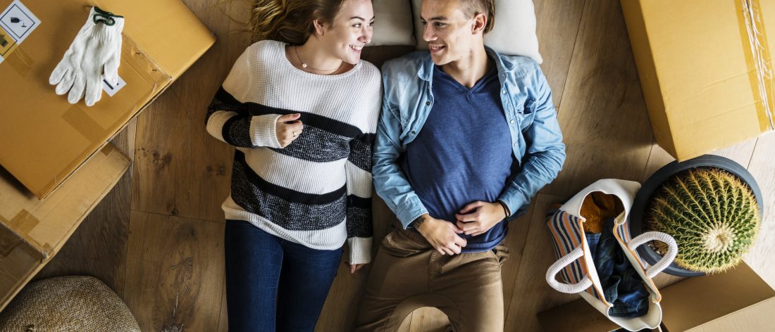 Couple in bed, talking
