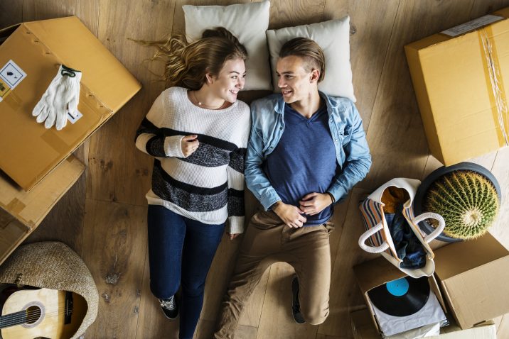 Couple in bed, talking