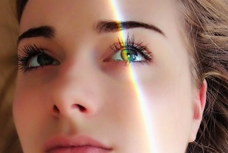Woman with light on her face - Intuitively Making Smart Decisions