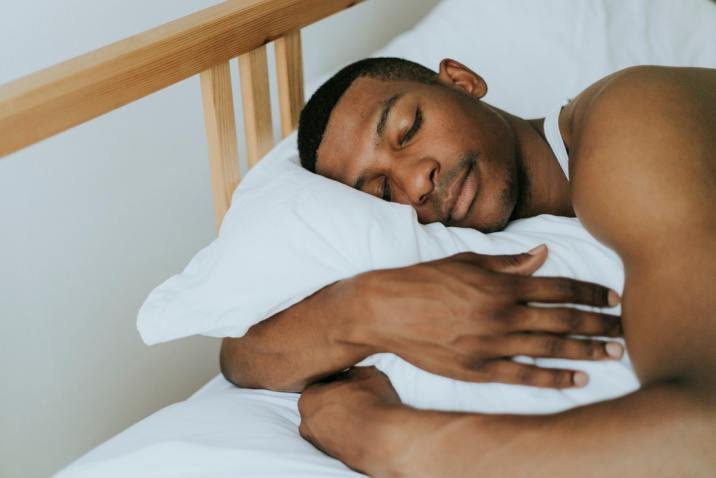 Man who exercises sleeping well