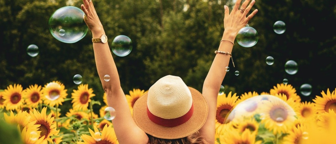 Woman in flowers living a precious life